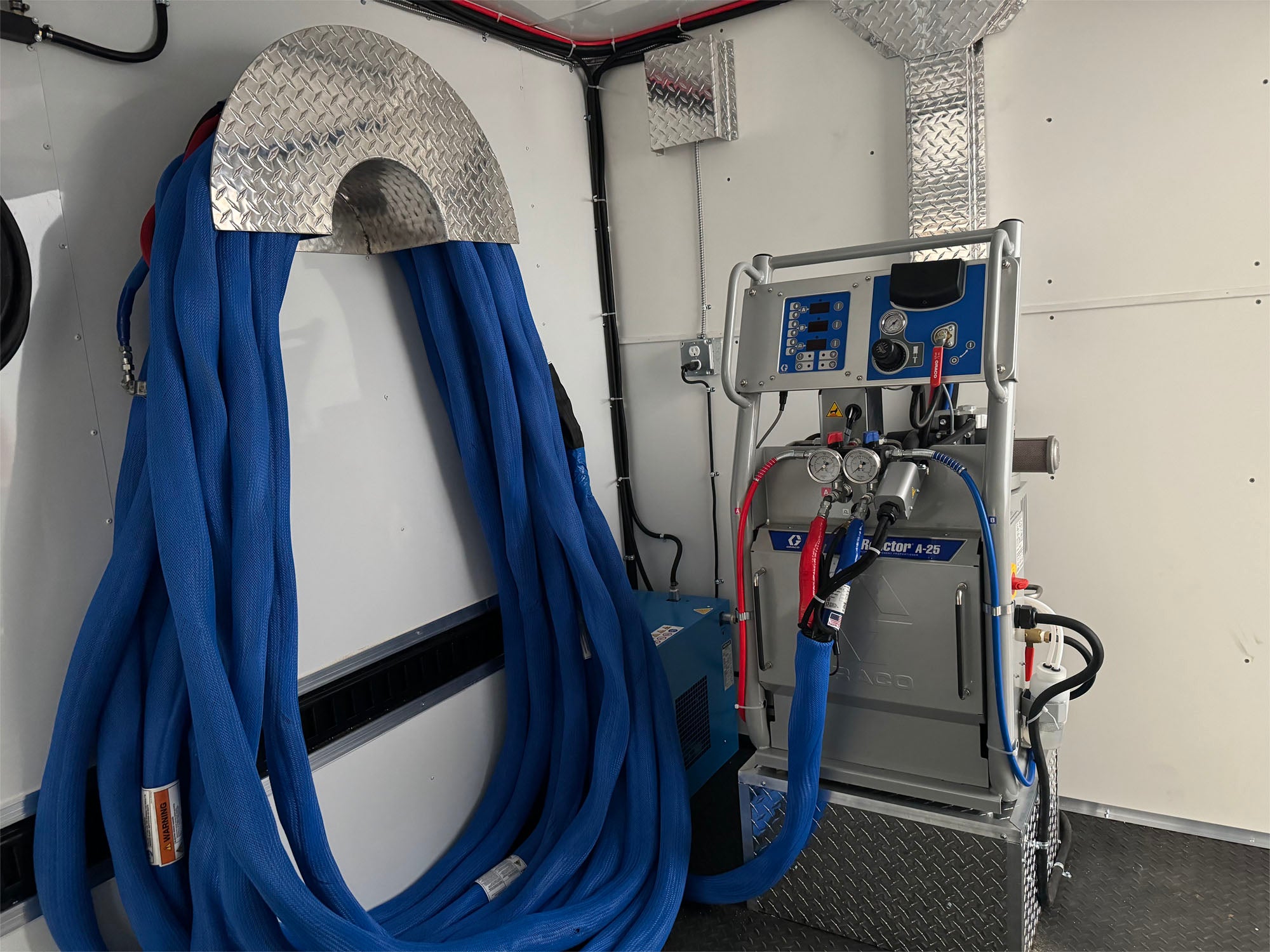 Graco A25 spray foam rig with Graco AP Fusion gun, 14 kW gas generator, and 7'x16' trailer