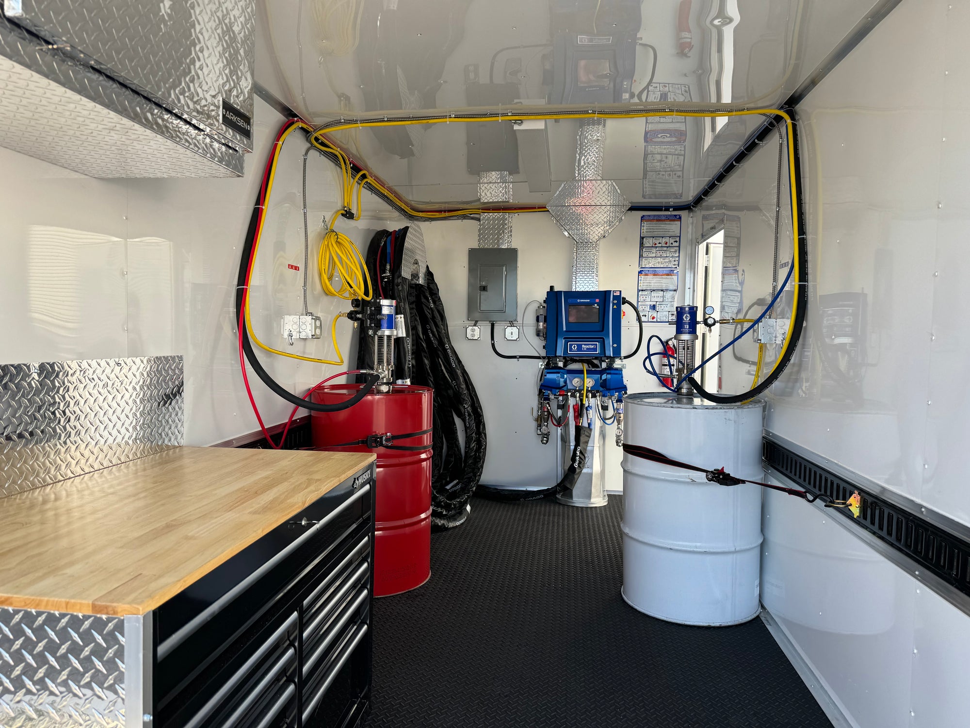 Graco E20 Reactor 3 Pro spray foam rig with Graco PC Fusion gun, 25kW diesel generator, and 7'x20' trailer