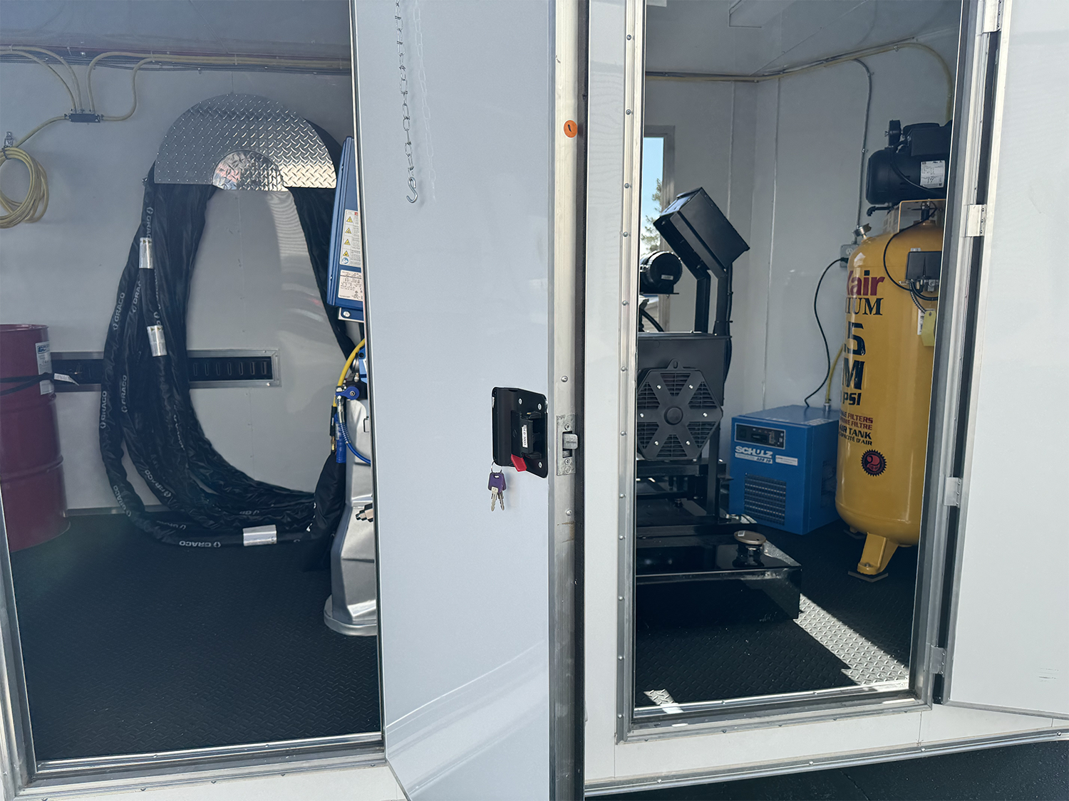Graco E20 Reactor 3 Pro spray foam rig with Graco PC Fusion gun, 25kW diesel generator, and 7'x20' trailer